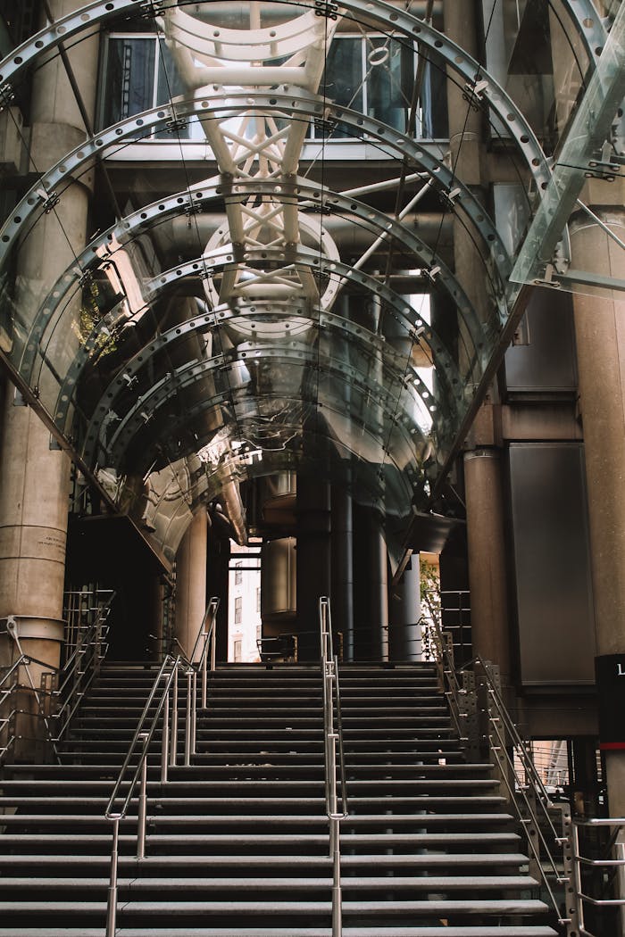 Impressive view of the Lloyd Building entrance in London showcasing modern architecture and design.
